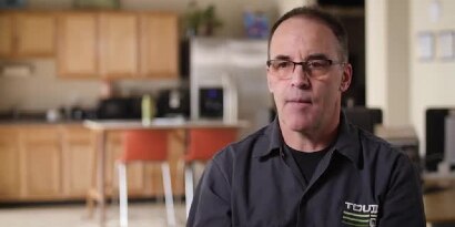 Video still of Paul Bulger, co-founder of TOURIG, discussing how 3M™ Dual Lock™ tapes help the company’s production
