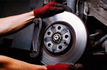 Man holding brake disc