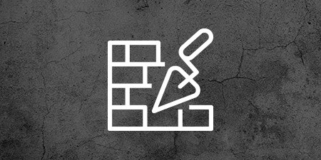 Brick wall icon on dark concrete texture
