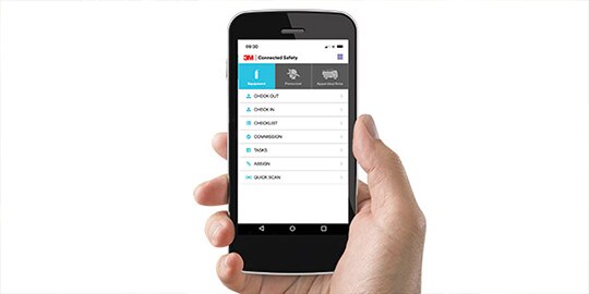 Man holding phone showing Safety Inspection Manager software
