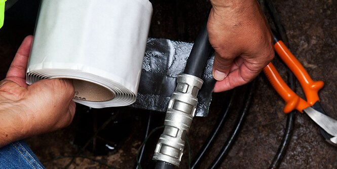 electrical cable wrapped in moisture sealing tape
