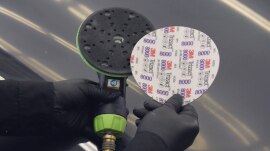 Hookit Foam Abrasive Disc being attached to dual action sander