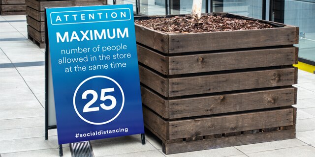 A sidewalk lunch sign showing a mexican restaurant's lunch specials in front of a fire graphic, wrapped using 3m IJ35C film.