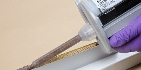 Applying void filler with pneumatic dispenser
