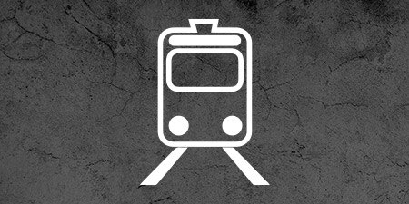 Train icon on dark concrete texture

