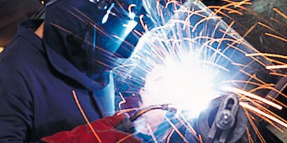welder wearing safety equipment
