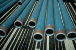 Row of coated pipe joints