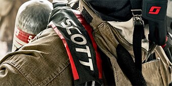 Person wearing 3M Scott Safety respiratory protection
