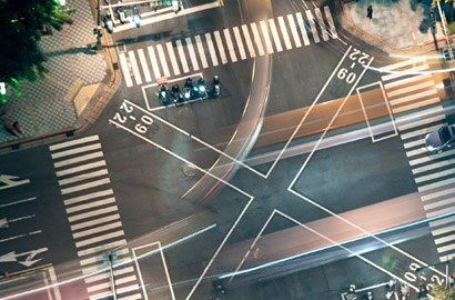 Busy junction at night from above