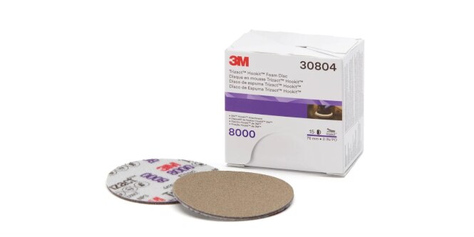 Package of abrasive discs used to remove fine sand scratches on painted surfaces.
