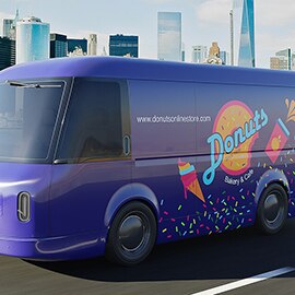 Purple delivery truck displaying full color change film and print wrap of their bakery and cafe logo and imagery.