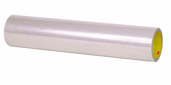 Large roll of dirt trap clear adhesive commonly used on windows to protect from paint spray and other particles.

