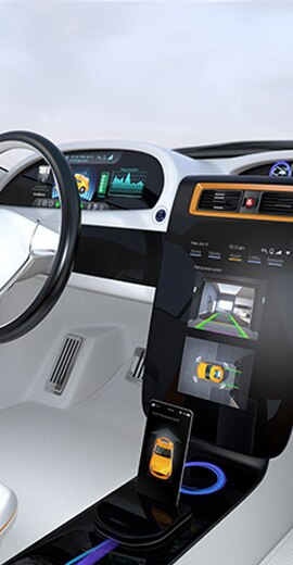 Internal graphic of a vehicle showing the steering wheel, head up display, and console display.