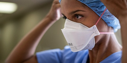 Nurse wearing PPE

