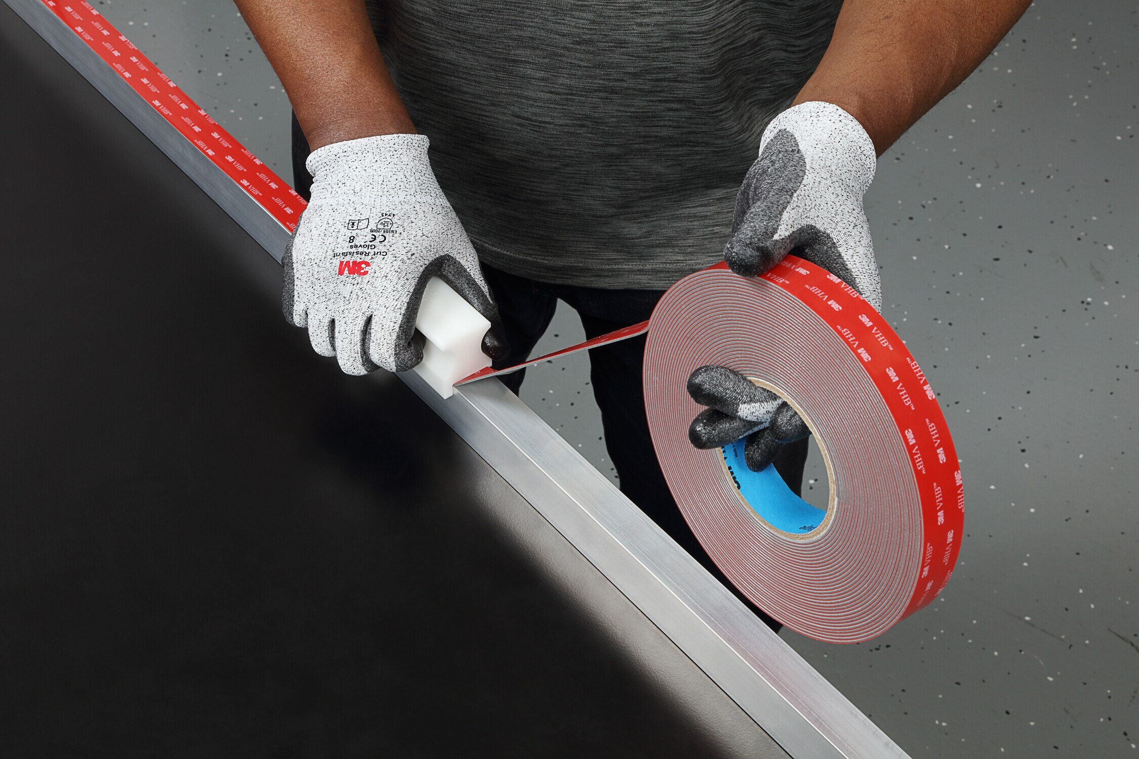 Roll of VHB tape applied manually
