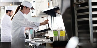 chefs working in a clean kitchen
