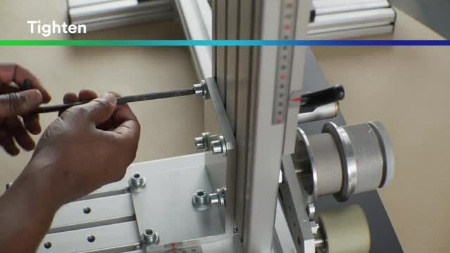 Image of someone adjusting the height of the 3M™ Straight Line Laminator
