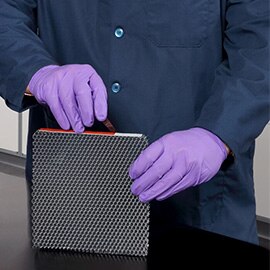 Technician peeling liner from structural core splice film; structural core splice film applied.