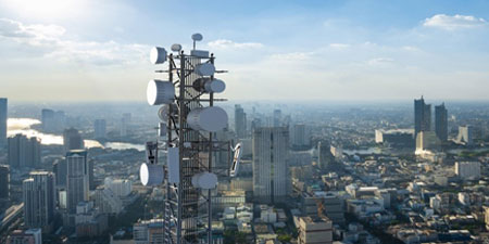 Photo of a skyline with 5G network infrastructure.