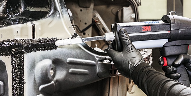 technician applying 3M OEM Match Seam Sealer
