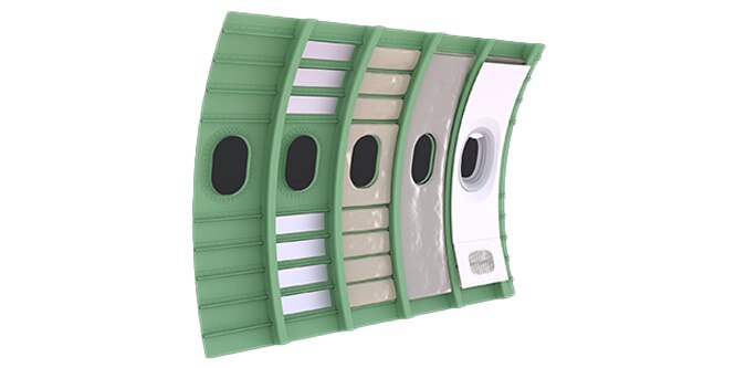 Interior airplane rendering of side panels showing layers of acoustic materials.

