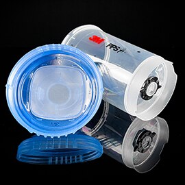 image of vented spray cup on it's side with inside lid on display